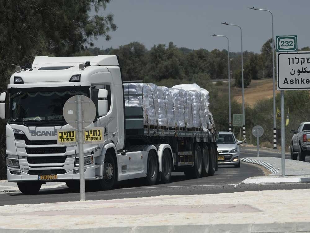 Humanitarian group pauses Canadian aid trucks bound for Gaza, citing Israeli restrictions