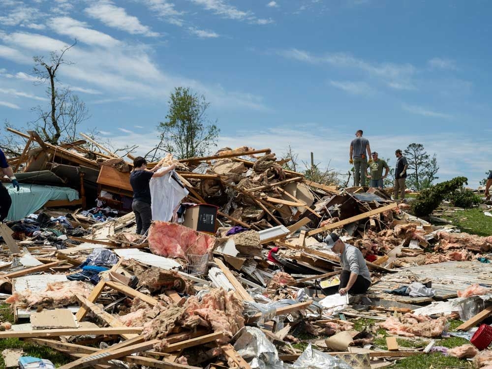 Residents dig out from tornado damage after storms kill 28 in Kentucky, Missouri and Virginia