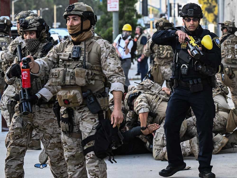 Military commander says 200 Marines moved into Los Angeles to protect federal property and personnel