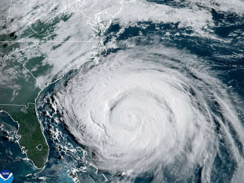 Summer celebrations meet closed beaches and warnings on U.S. East Coast due to Hurricane Erin