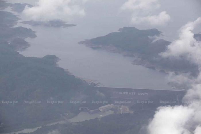 Sirikit Dam opens taps to make room for looming deluge