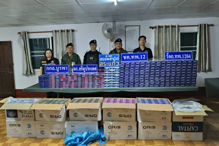 Thai troops seize 13,000 untaxed cigarette packs hidden in sugarcane field