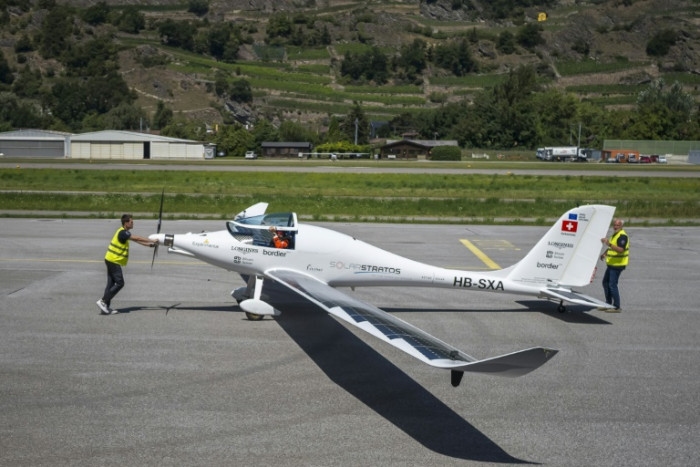 Swiss pilot breaks solar-powered plane altitude record