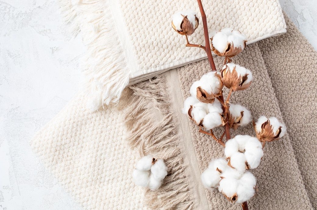 ICE cotton drops on US rains, early Indian monsoon