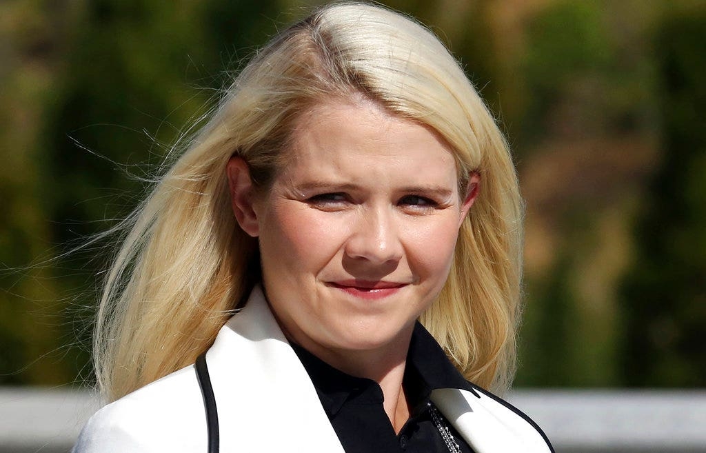 Convicted Elizabeth Smart kidnapper flashes huge smile in new mugshot for Utah's sex offender registry