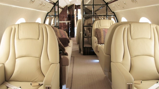 Wealthy travelers use invite-only WhatsApp groups to find and share private jet seats at discount prices
