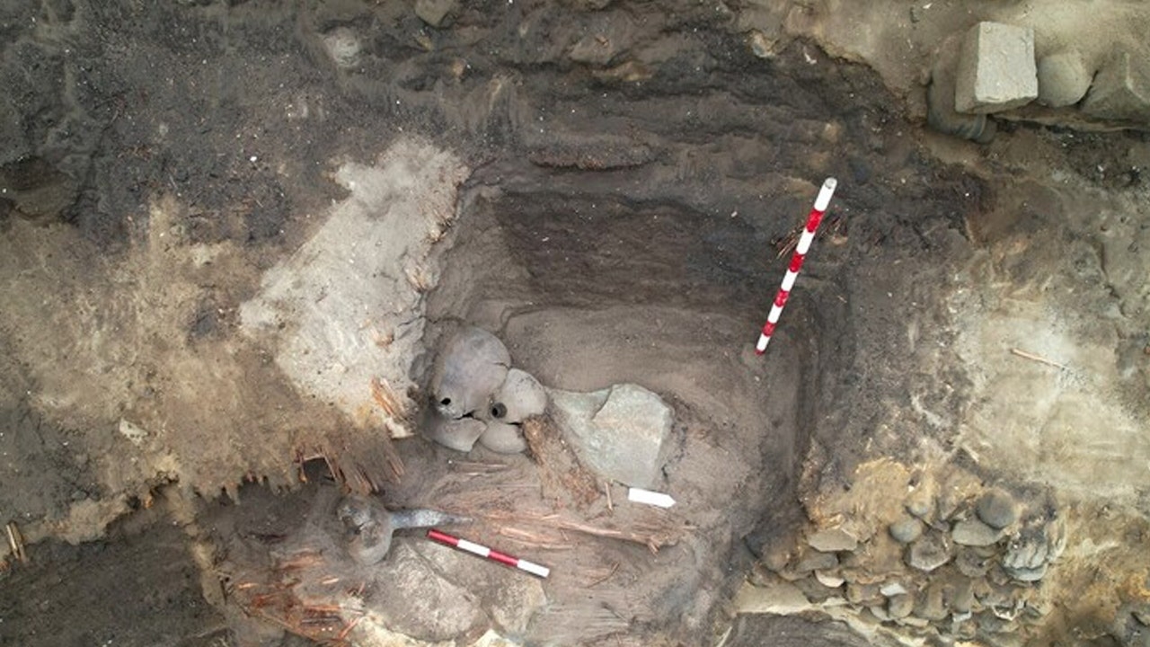 Archaeologists unearth body of 5,000 year-old woman in former dump