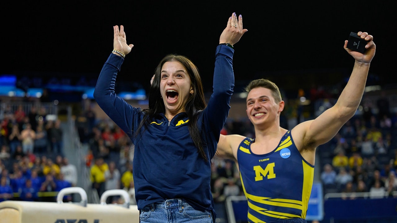 Olympic medalist Paul Juda helps Michigan to national title, pops question to girlfriend