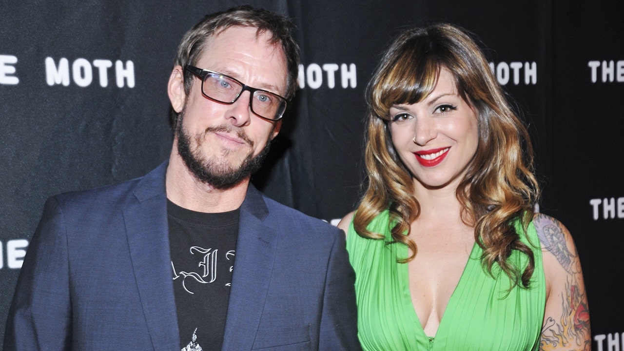 Weezer bassist Scott Shriner's wife shot by police, booked for attempted murder