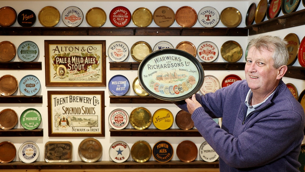 Man crafts world's largest beer tray collection of 1,500 items: 'Part of history'