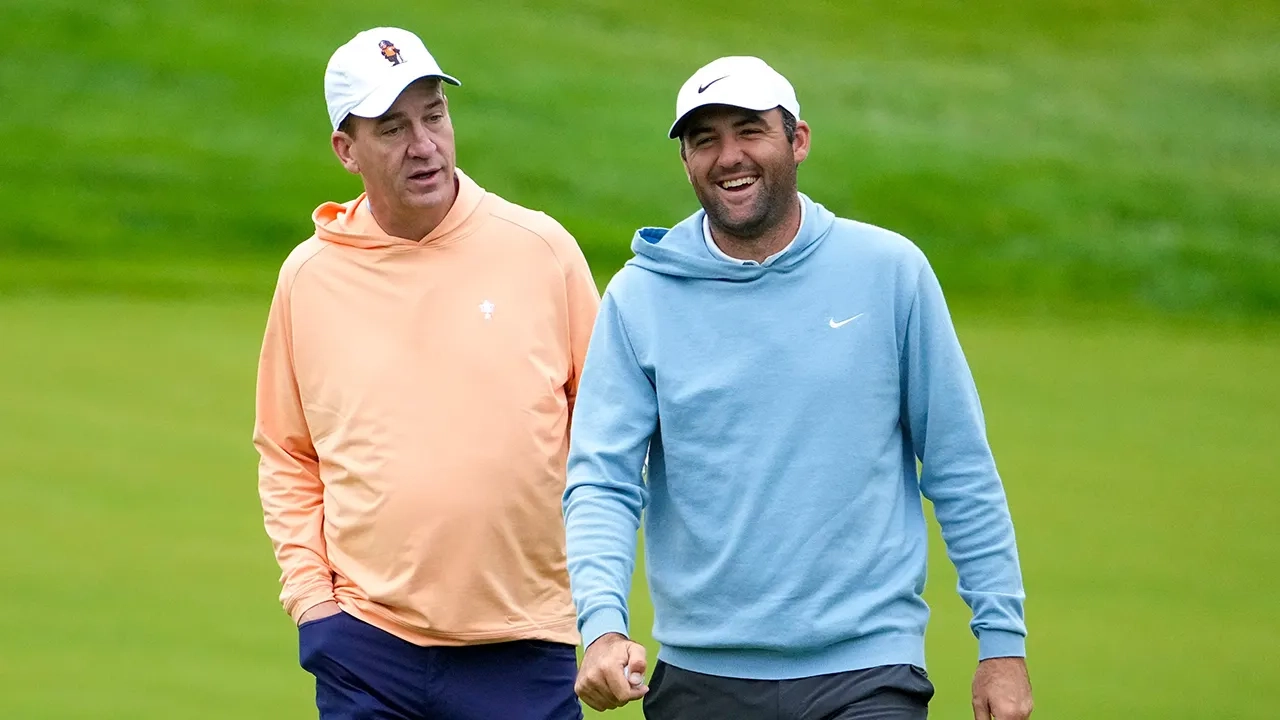 Scottie Scheffler breaks out in laughter after Peyton Manning's errant tee shot reportedly hits house