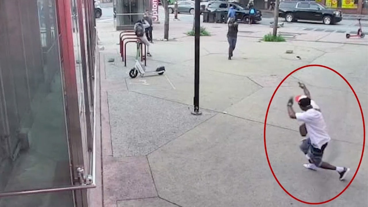 Suspect killed, officer injured in Baltimore shooting as bodycam captures cries of 'cease fire'