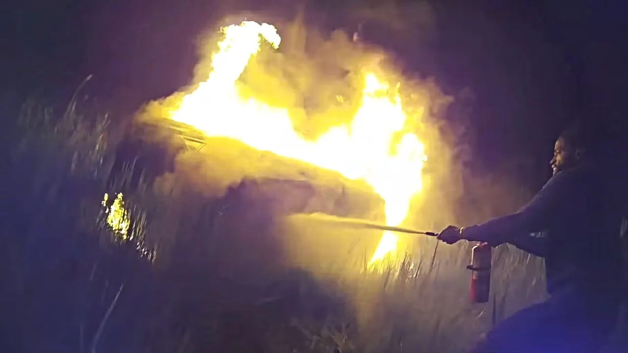New York police officer and Good Samaritans save 68-year-old woman from vehicle engulfed in flames