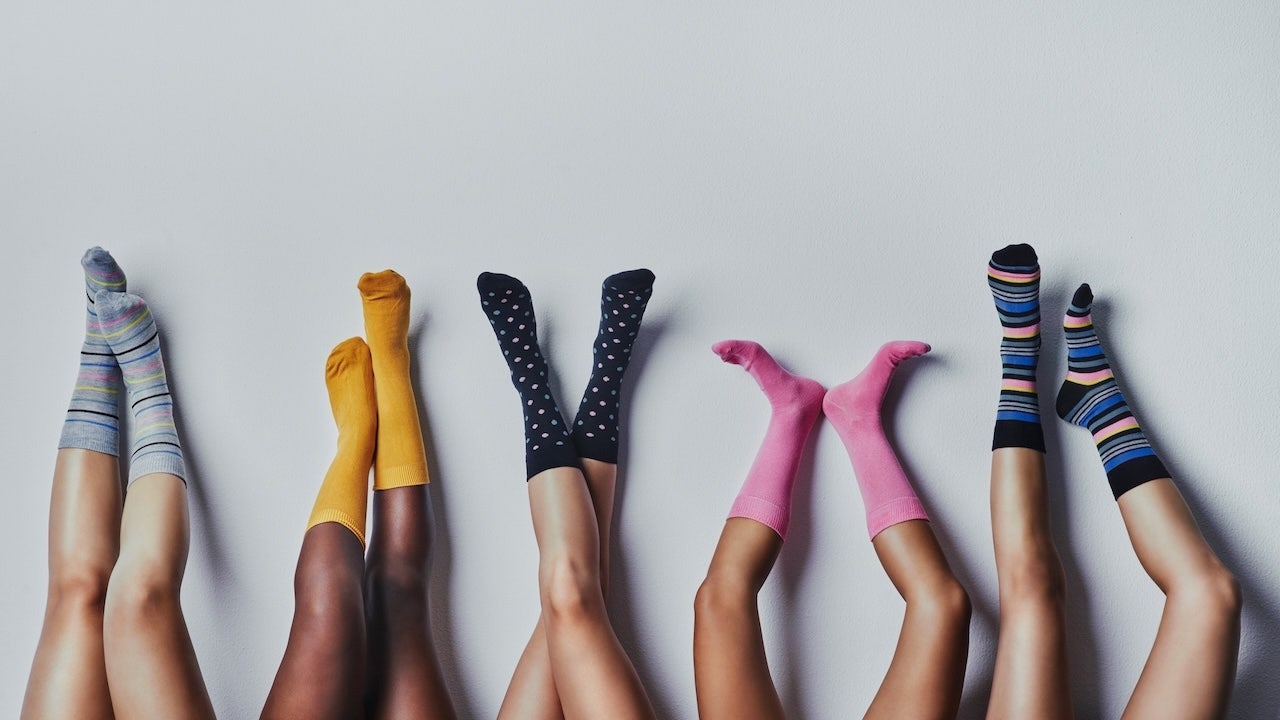 Compression socks and slip-on sneakers for comfortable travel