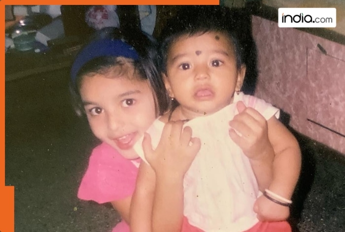 The girl in this photo has now become a sensation in South cinema, can you recognise her? Her name is....