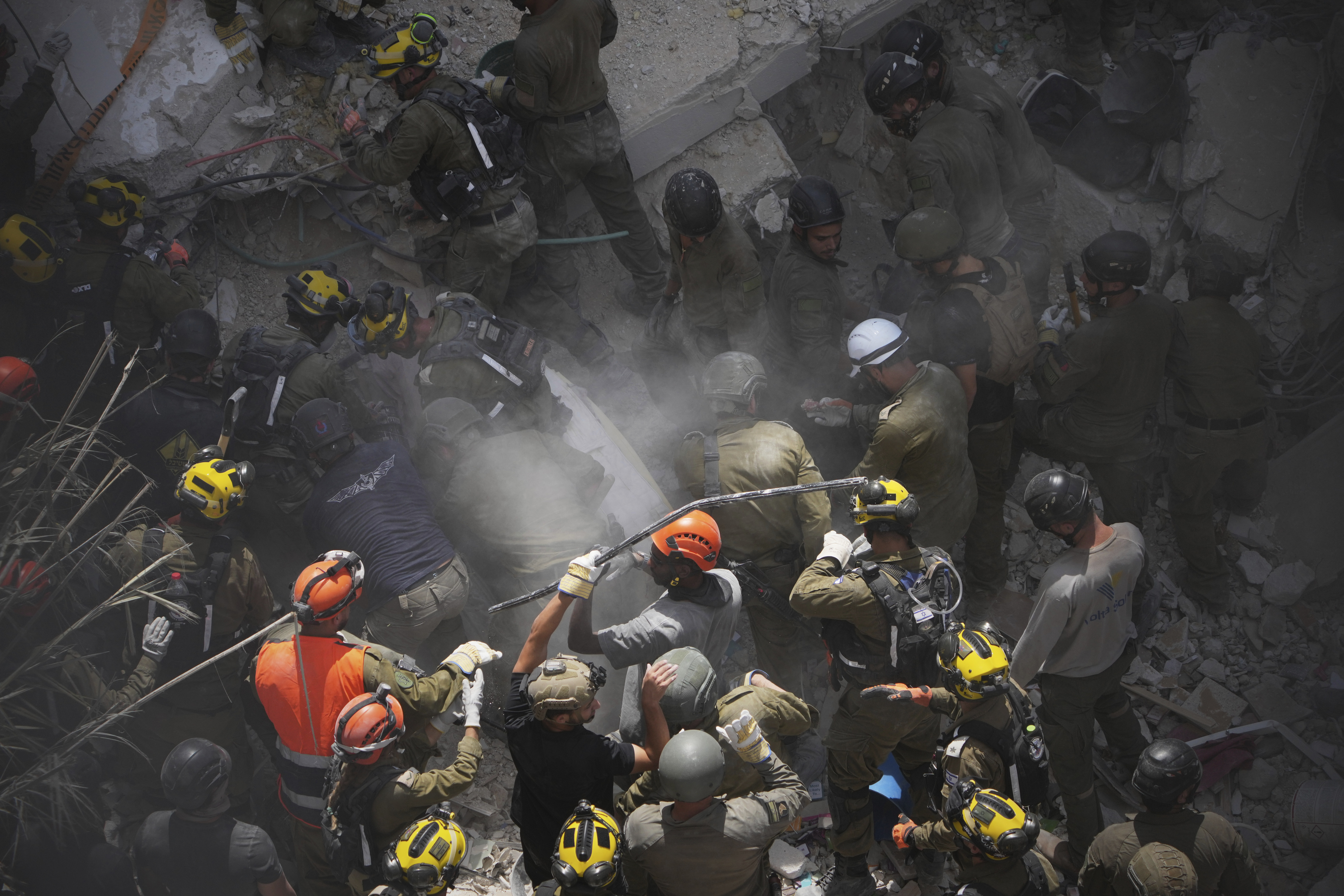 Death toll grows as Israel and Iran trade attacks for third day