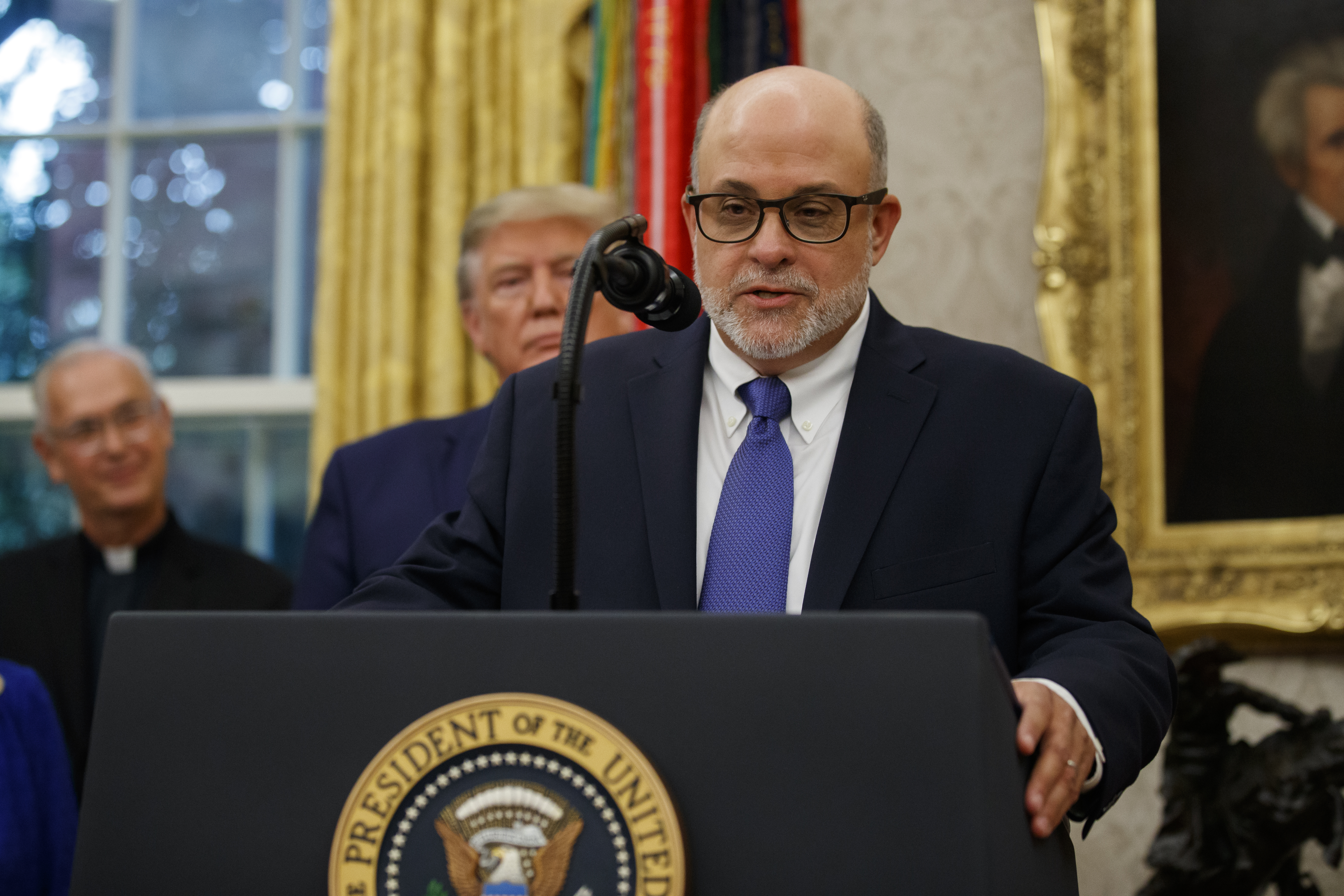 Inside the MAGA vs. hawk battle to sway Trump on bombing Iran