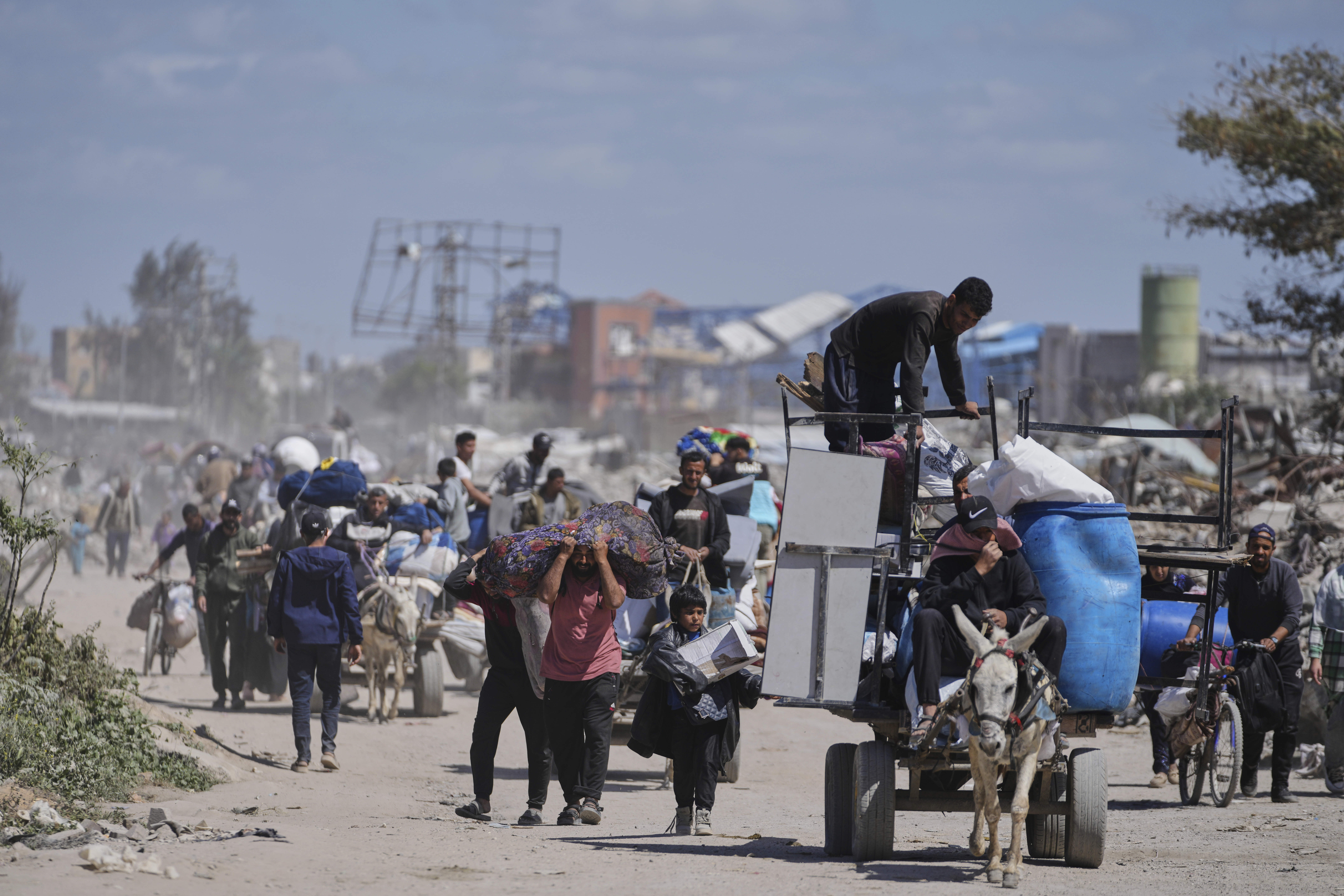 Israeli troops advance in Gaza to retake part of corridor dividing north from south