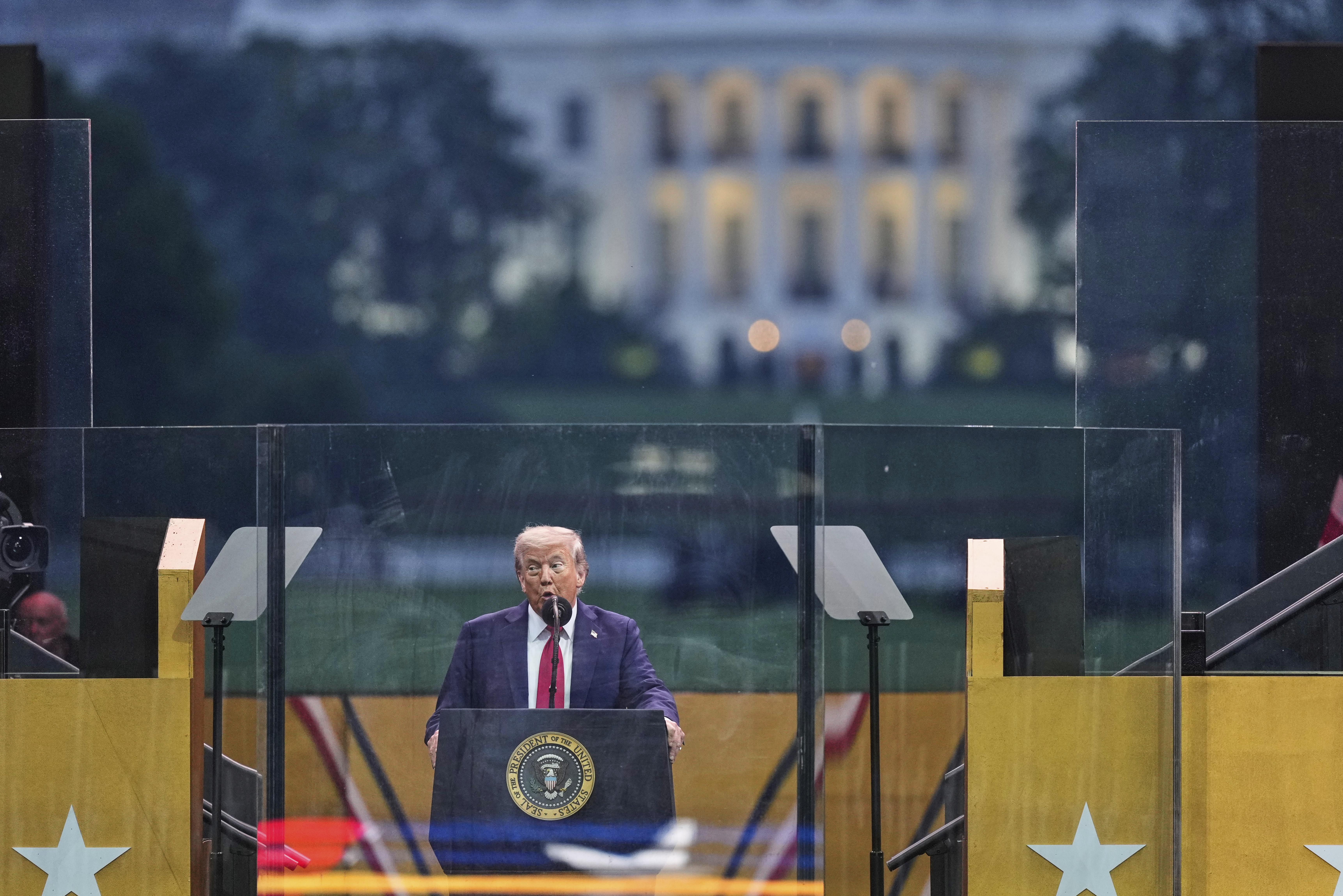 Trump celebrates U.S. military might amid tensions at home and abroad