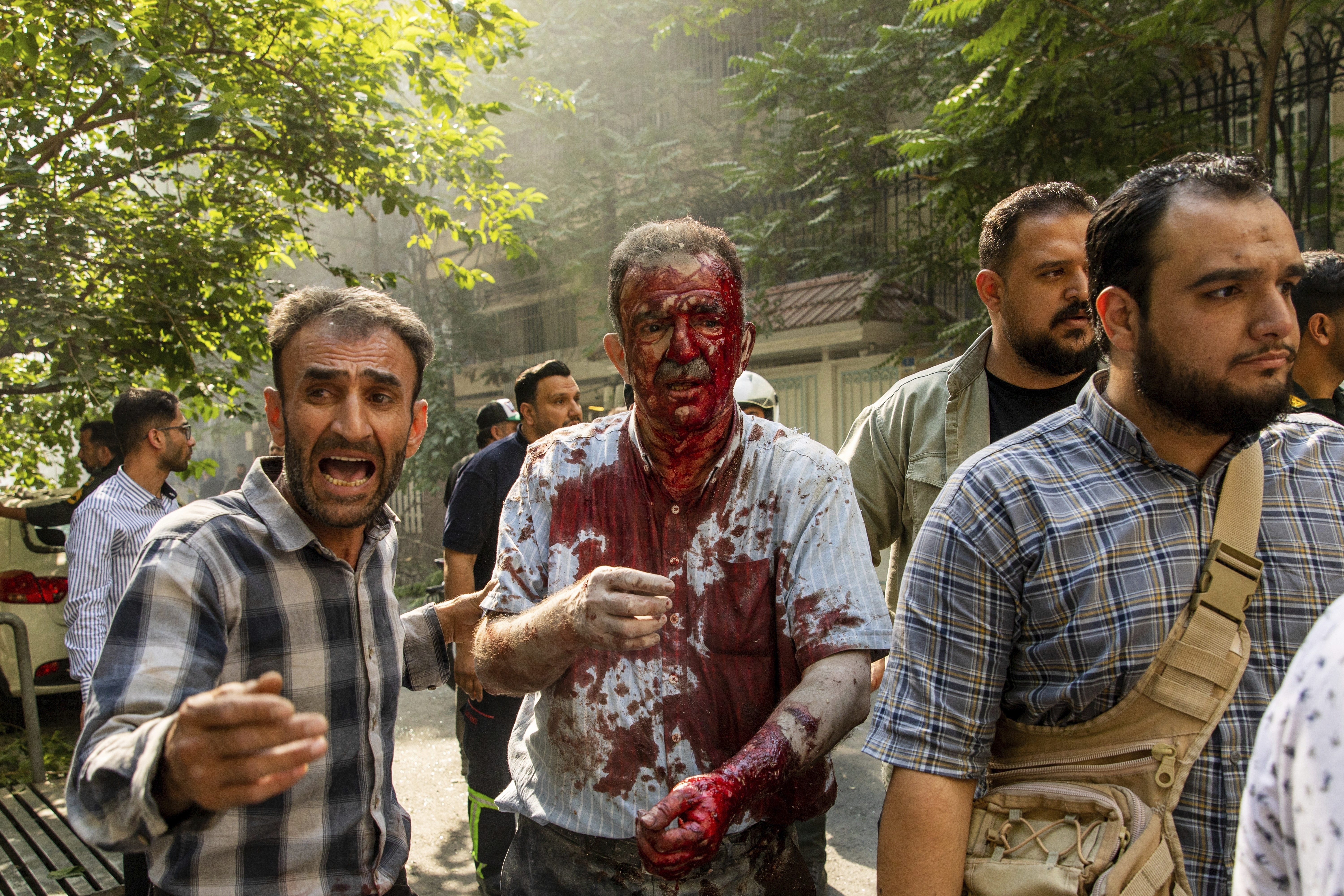 Israel and Iran trade strikes for third day as hundreds reported dead