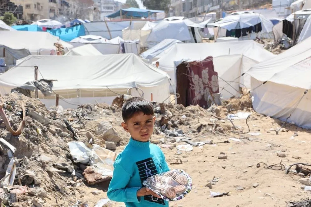 ‘Eid of Sadness': Palestinians in Gaza Mark Holiday with Dwindling Food and No End to War