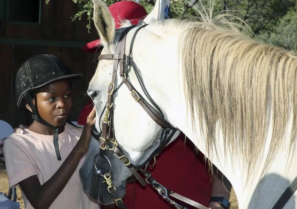 Horse Therapy Program in Namibia Brings Joy to Children with Learning Disabilities