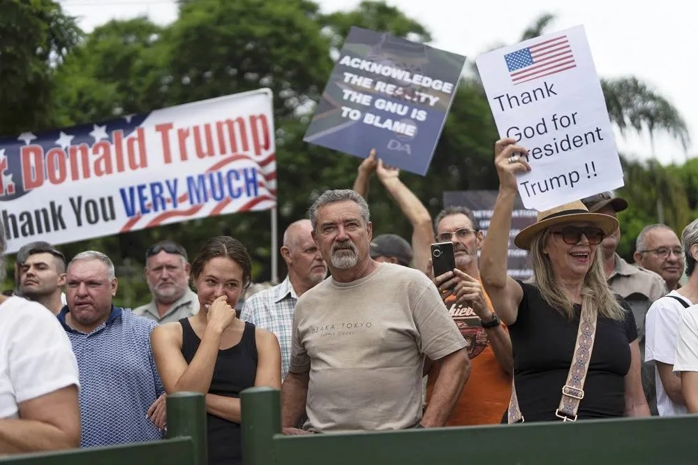 First White South Africans Fly to US Under Trump Refugee Plan