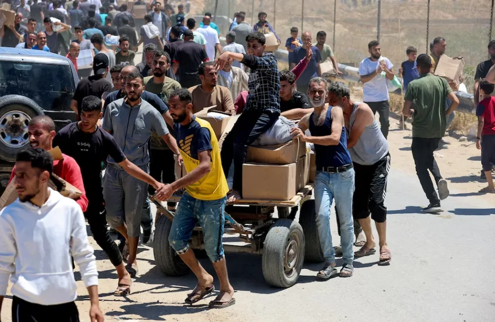 Gaza Aid Supplies Hit by Looting as Hamas Ceasefire Response Awaited