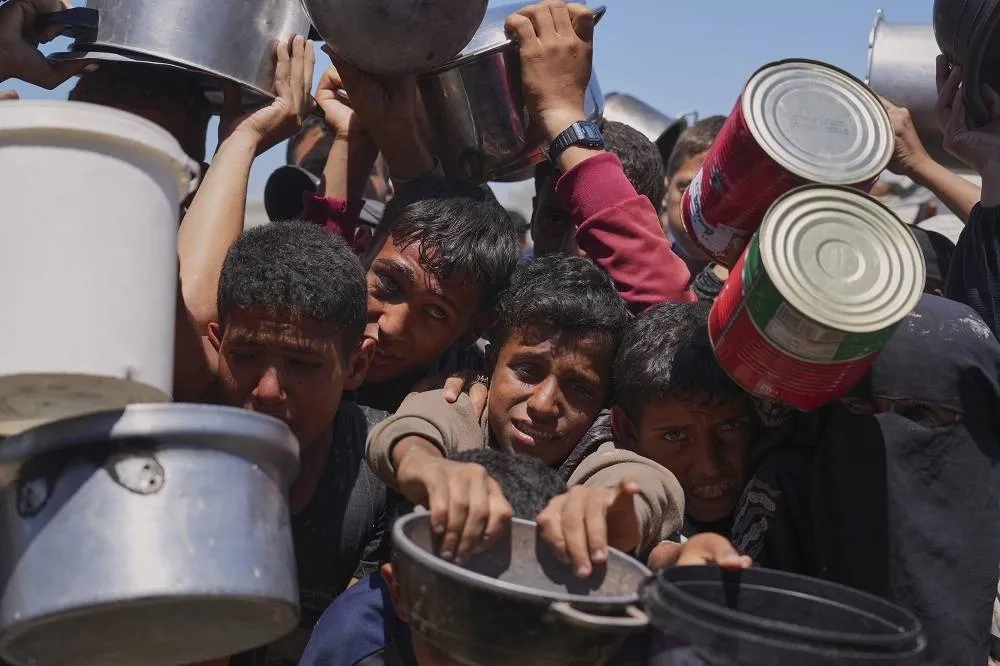 3 People Reported Killed, Dozens Wounded by Israeli Gunfire at Aid Site in Gaza, Medics Say