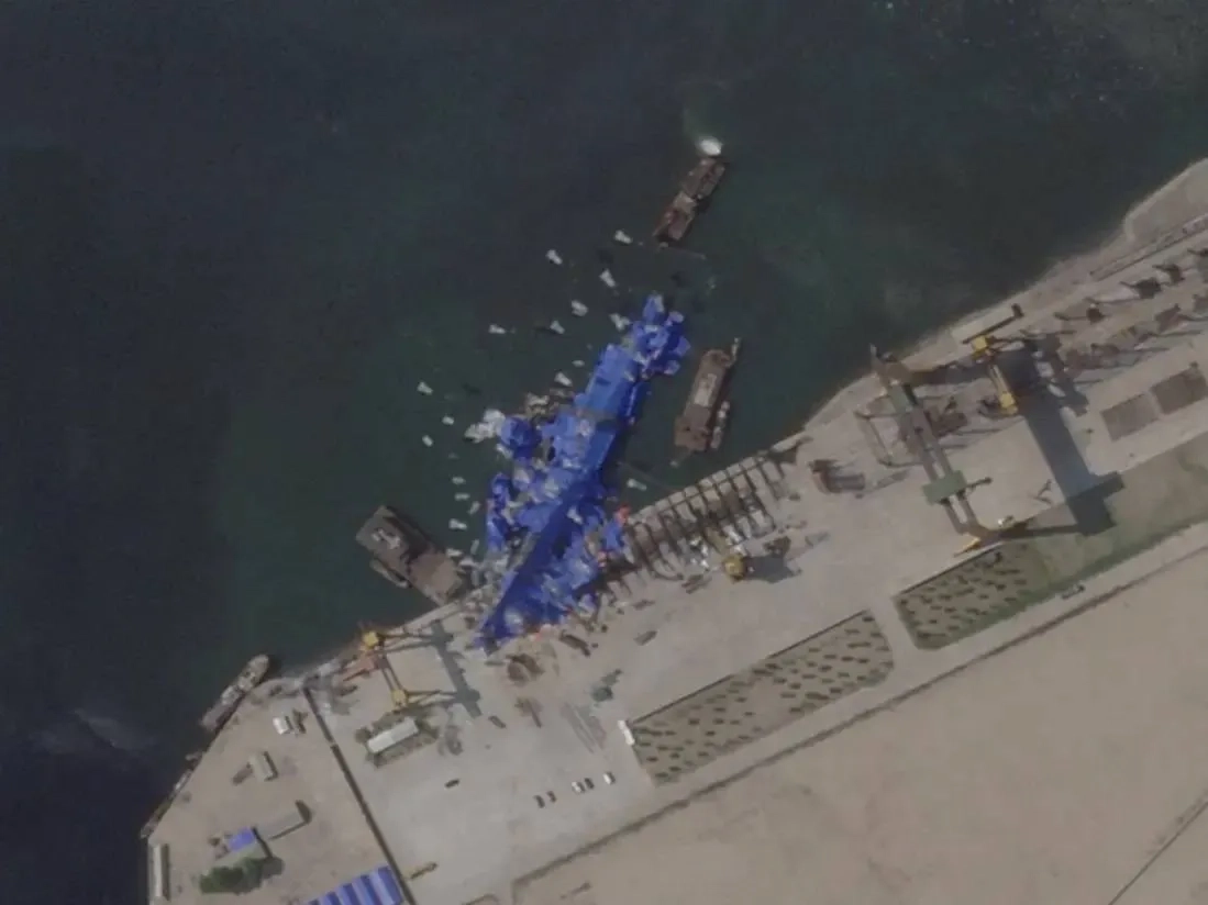 North Korea Pulls Capsized Warship Upright After Botched Launch, Report Says