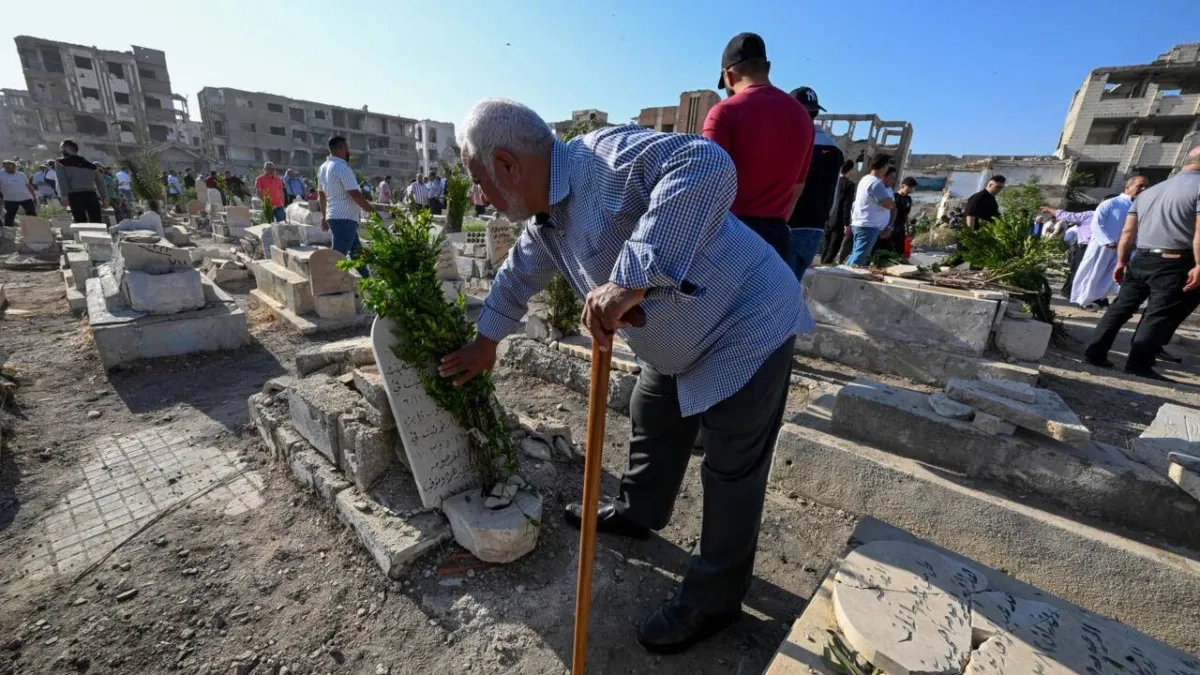 In Syria's Devastated Jobar, Cemetery Comes Alive for Eid