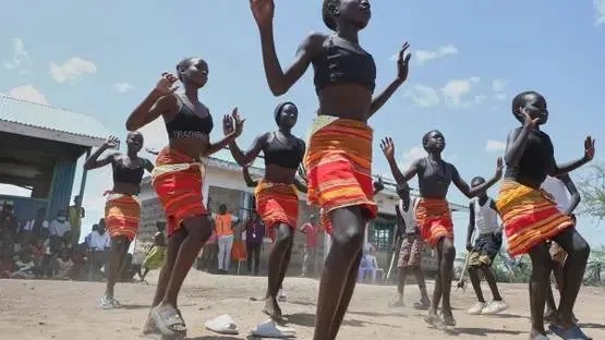 Fusion Between Culture and Modernity as Children Dance in Kenyan Refugee Camp