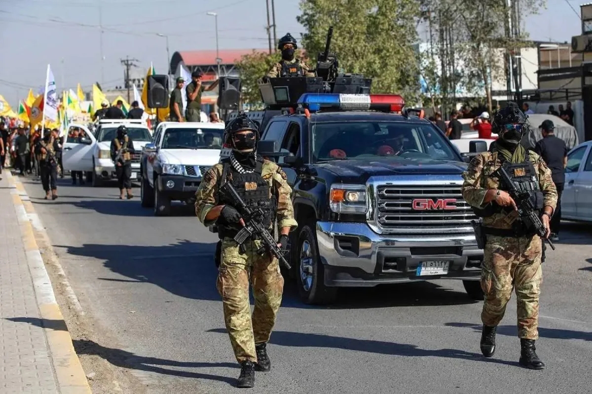 Iraqi Police Clash with PMF Fighters Who Stormed Government Building