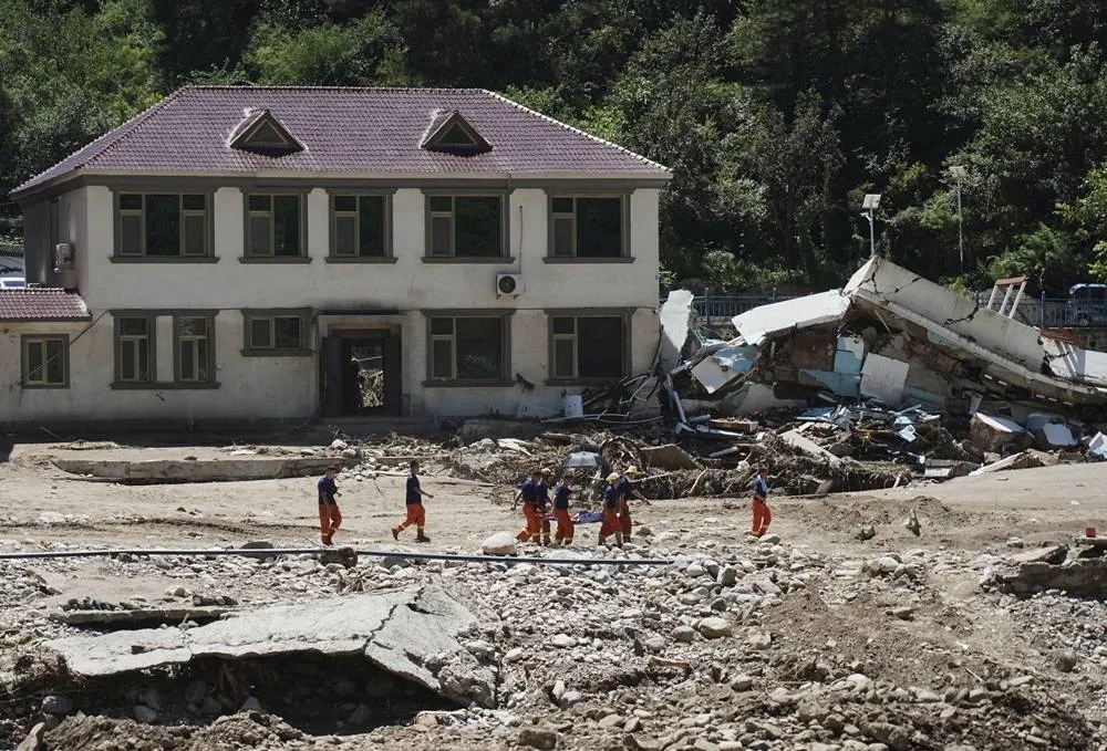 Beijing Expands Storm Alert as Fatal Floods Keep City on Edge