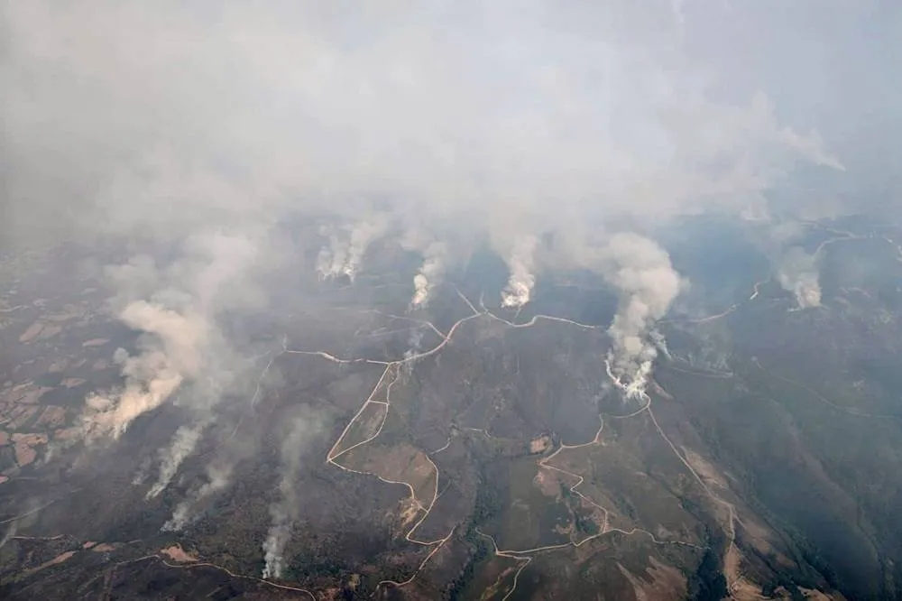 Spain Battles 14 Major Fires with ‘Unfavorable Conditions' Expected to Fuel More