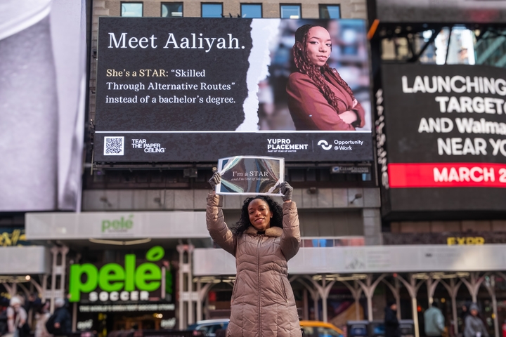 Meet the tech worker who went from Amazon warehouse to Times Square billboard