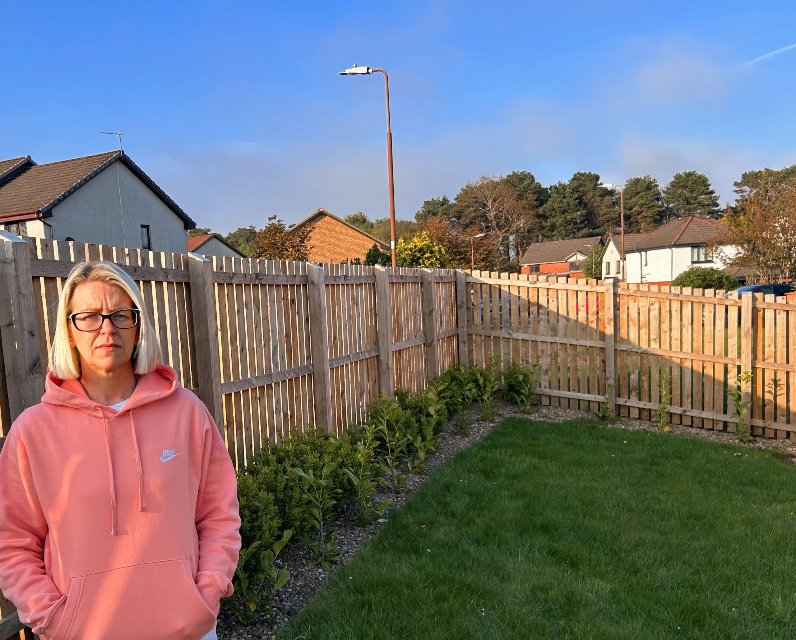 Livingston woman vows to fight on against order by councillors to tear down fence