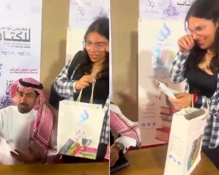 شاهد: فتاة تونسية تنهار بالبكاء بجانب الكاتب السعودي أسامة المسلم  بعد حصولها على توقيعه