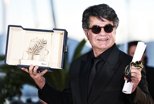 Iran summons French envoy after FM's Cannes