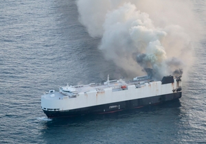22 crew members rescued from lifeboat in North Pacific after ship carrying 3,000 cars catches fire