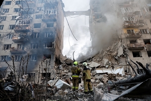 Russia attacks Kyiv with waves of drones, missiles