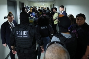 US lawsuit seeks to stop arresting migrants