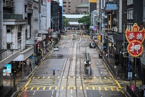 Typhoon Wipha topples trees and causes major flight disruptions in Hong Kong and southern China