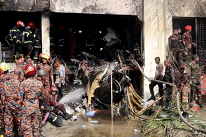 Bangladesh jet crashes into school, kills at least 25