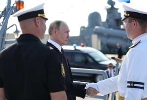 Russia scales down celebrations honoring its navy as Ukraine launches more drone attacks