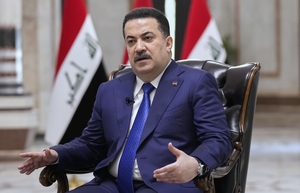Iraqi prime minister removes paramilitary commanders after deadly clash with police