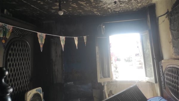 بالصور.. السيطرة على حريق وحدة سكنية بحي الزهور في بورسعيد