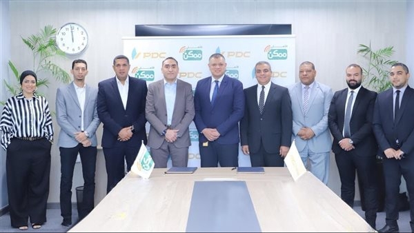 الأهلي ممكن والبريد للتوزيع يتعاونان لتوسيع الشمول المالي