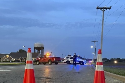 Vehicle smashes through Illinois building, killing 4 young people