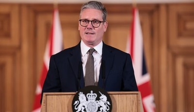 UK unveils immigration reforms to cut net migration by 100,000 a year